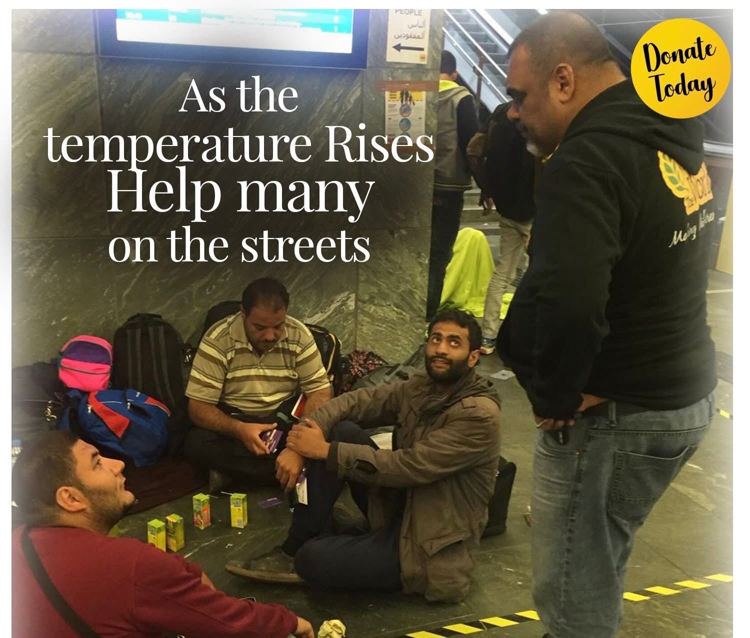 Volunteer reaching out to people sleeping rough on the streets